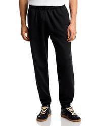 PAPER PLANES - Script Weld Sweatpants - Lyst