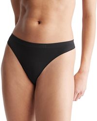 Calvin Klein - Bonded Flex Mid Rise Thong - Lyst