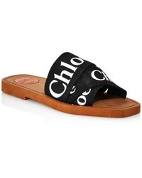Chloé Woody Logo Flat Denim Slide Sandals in Deep Denim (Blue) | Lyst