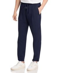 Herno - Nylon Stretch Slim Fit Pleated Pants - Lyst