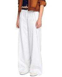 Sandro - Everly Pleated Wide Leg Jeans - Lyst