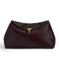 TOTEME - T Lock Calf Hair Convertible Clutch - Lyst