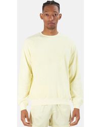light yellow crew neck sweatshirt