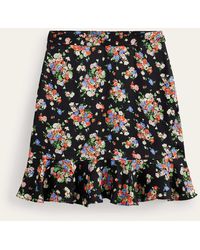 Boden - Mini-jupe florale à volants en satin - Lyst