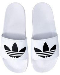 adidas Slip-on shoes for Men - Up to 45% off | Lyst