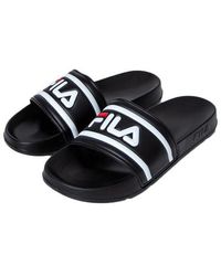 white fila slippers