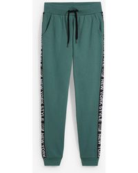 bonprix - Sweatpants Met Tapes En Statement Print - Lyst