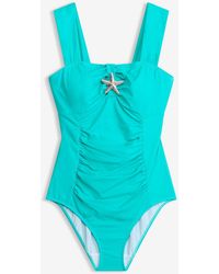 bonprix - Medium Corrigerend Badpak Met Zeester - Lyst
