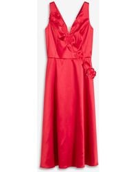 bonprix - Midikleid Aus Glänzendem Satin Mit Blumen-Applikation - Lyst