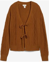 bonprix - Strickjacke Mit Schleifen - Lyst