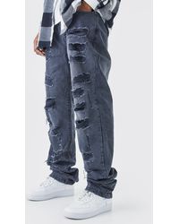 BoohooMAN - Tall lockere Jeans mit extremen Rissen - Lyst