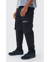 BoohooMAN - Straight Leg Multi Zip Ripstop Cargo Trouser With Woven Tab - Lyst