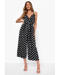 Boohoo - Polka Dot Strappy Wrap Culotte Jumpsuit - Lyst