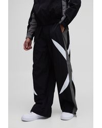 BoohooMAN - Elasticated Waist Parachute Side Stripe Pants - Lyst