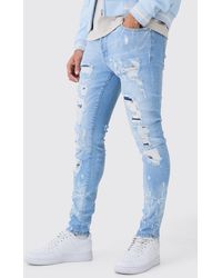BoohooMAN - Skinny Stretch Multi Rip Jeans In Light Blue - Lyst