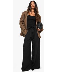 Boohoo - Woven Pleated Belted Wide Leg Trouser - Lyst
