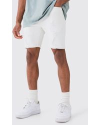 BoohooMAN - Skinny Stretch Distressed Denim Shorts In White - Lyst