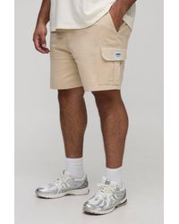 Boohoo - Plus Elasticated Waist Relaxed Fit Woven Tab Cargo Shorts - Lyst
