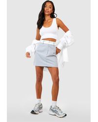 Boohoo - Petite Reverse Waistband Tailored Mini Skirt - Lyst