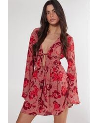 Nasty Gal - Floral Ruched Tie Front Fluted Sleeve Tunic Dress - Lyst