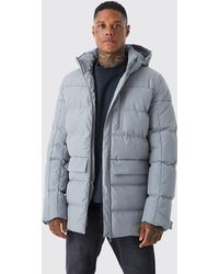 Boohoo - Longline Quilted Puffer With Hood - Lyst