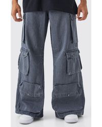 BoohooMAN - Lockere Jeans mit Cargo-Taschen und Acid-Waschung - Lyst