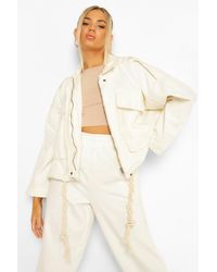 bershka pocket front utility denim jacket in beige