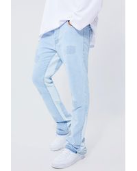 Boohoo - Slim Rigid Flare Distressed Applique Jeans - Lyst