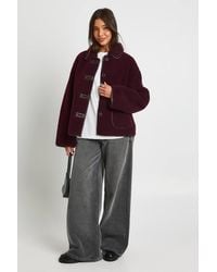 Boohoo - Contrast Binding Collared Teddy Jacket - Lyst