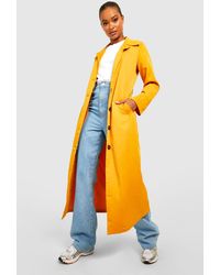 Yellow Coats for Women | Lyst