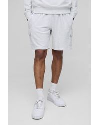 BoohooMAN - Lightweight Basic Relaxed Fit Mid Length Cargo Shorts - Lyst