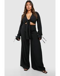 Boohoo - Plus Woven Knot Front Long Sleeve Jumpsuit - Lyst