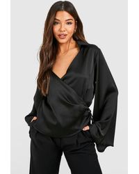 Boohoo - Satin Flared Sleeve Wrap Front Blouse - Lyst