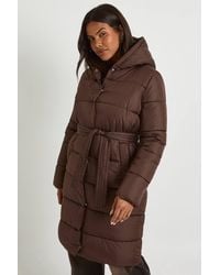 Boohoo - Belted Longline Puffer Jacket - Lyst
