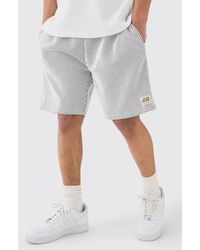 Boohoo - Relaxed Mid Length Textured Short With Woven Tab - Lyst