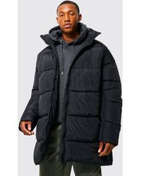 BoohooMAN - Oversized Mid Length Funnel Neck Puffer - Lyst