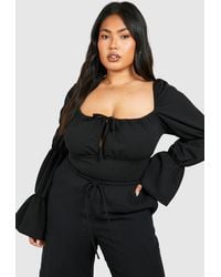 Boohoo - Plus Tie Front Long Sleeve One Piece - Lyst