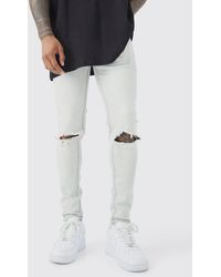 BoohooMAN - Super Skinny Stretch Multi Rip Stacked Jeans - Lyst