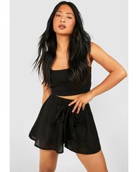 Boohoo - Petite Belted Floaty Short - Lyst