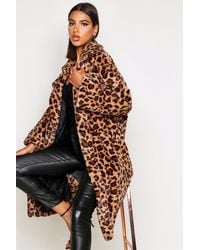 Boohoo Maxi cappotto in pelliccia sintetica maculata - Marrone