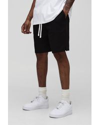 BoohooMAN - Tall Elasticated Waist Baggy Fit Split Hem Shorts - Lyst