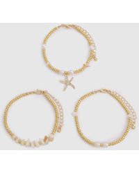 Boohoo - Pack De 3 Pulseras Con Estrellas De Mar Y Perlas - Lyst
