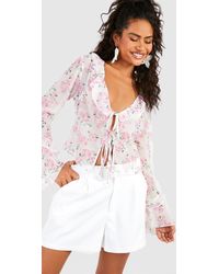 Boohoo - Floral Print Tie Front Ruffle Blouse - Lyst