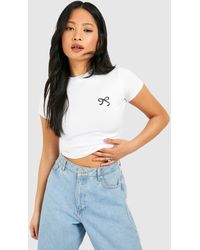 Boohoo - Petite Bow Embroidered Baby Tee - Lyst
