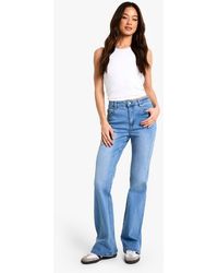 Boohoo - The Tall Low Waist Bootcut Jean - Lyst