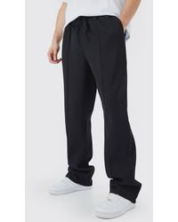 BoohooMAN - Tall Elastic Waist Relaxed Fit Pleated Trouser - Lyst