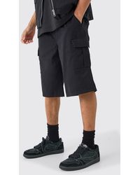 BoohooMAN - Elastic Waist Black Relaxed Fit Longer Length Cargo Shorts - Lyst