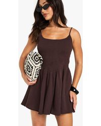 Boohoo - Petite Crinkle Cotton Shirred Strappy Mini Dress - Lyst