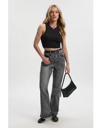 Boohoo - Petite Comfort Stretch High Waist Flared Jean - Lyst