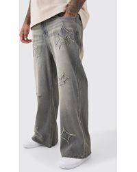 BoohooMAN - Plus Relaxed Rigid Flare Self Fabric Applique Gusset Jean - Lyst